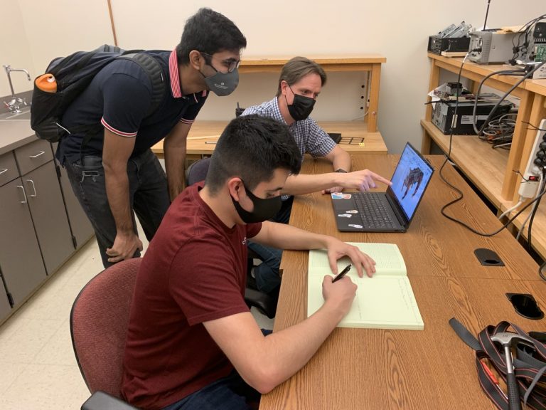 Engineer in Residence volunteer helps students with design project