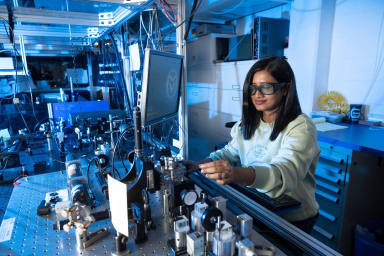 A scientist works in University Distinguished Professor Carmen Menoni’s Advanced Thin Films Deposition Laser Lab in May at CSU. Credit: CSU Photography